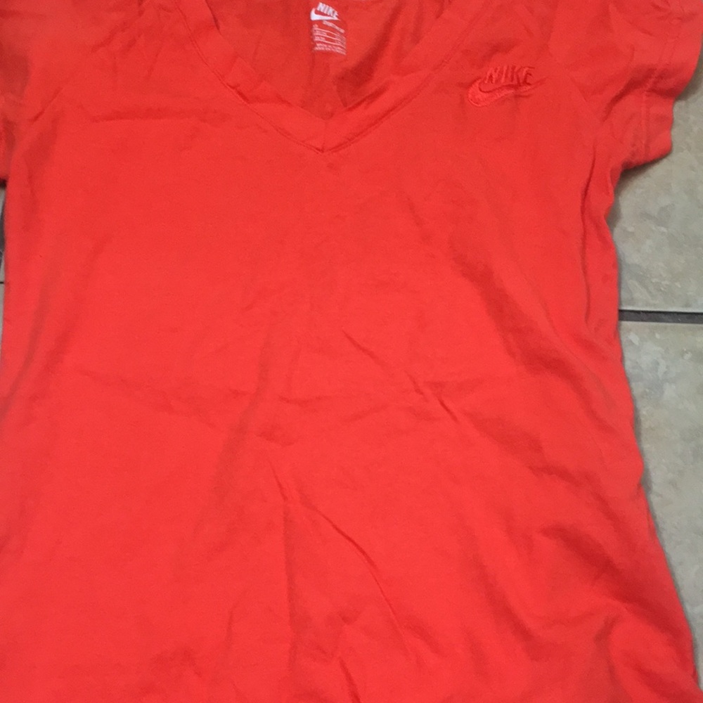 orange nike shirt